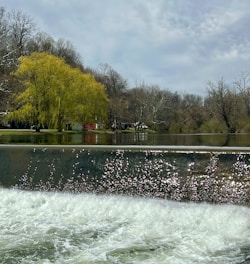 a man riding a jet ski on top of a lake