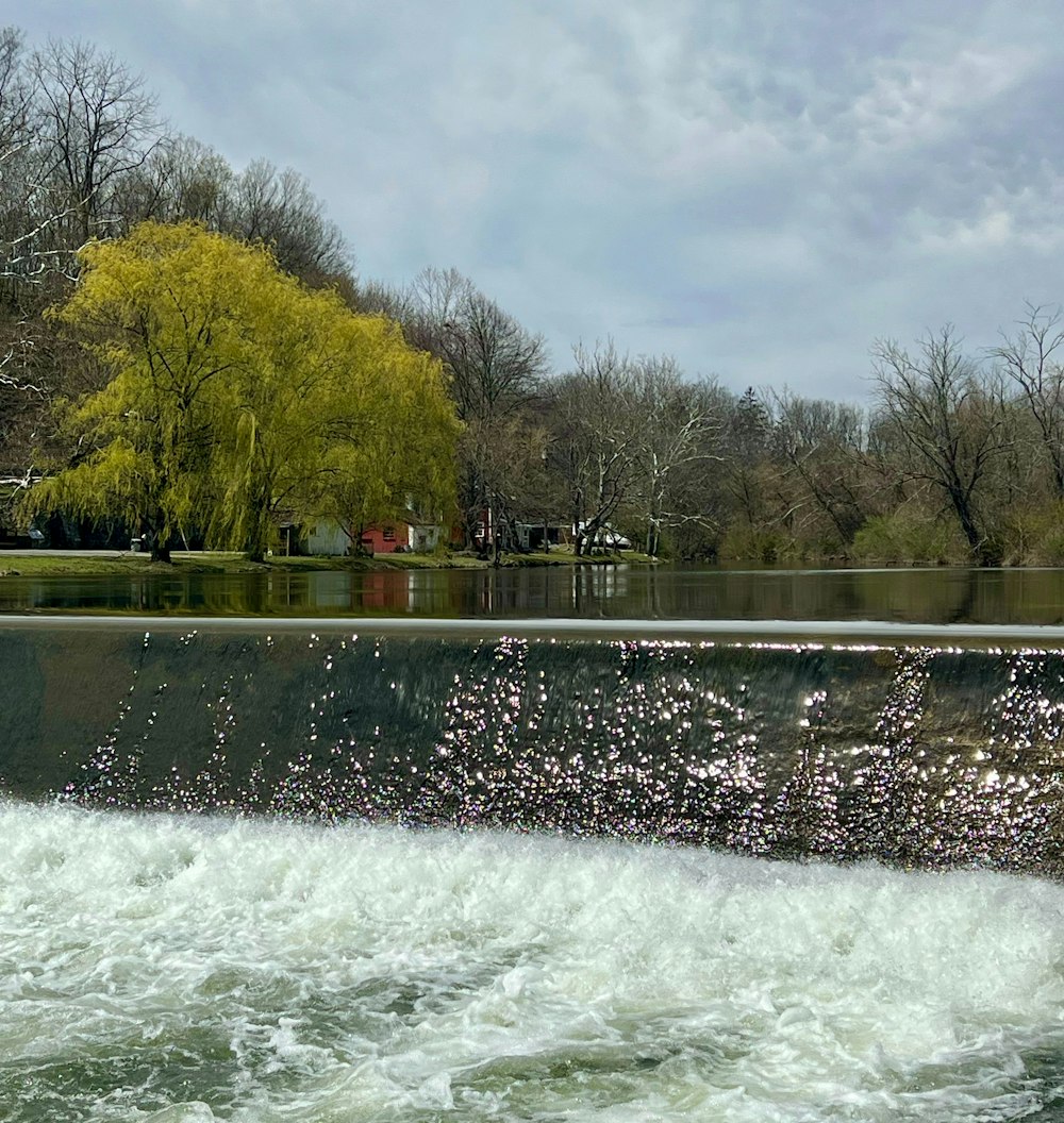 a man riding a jet ski on top of a lake