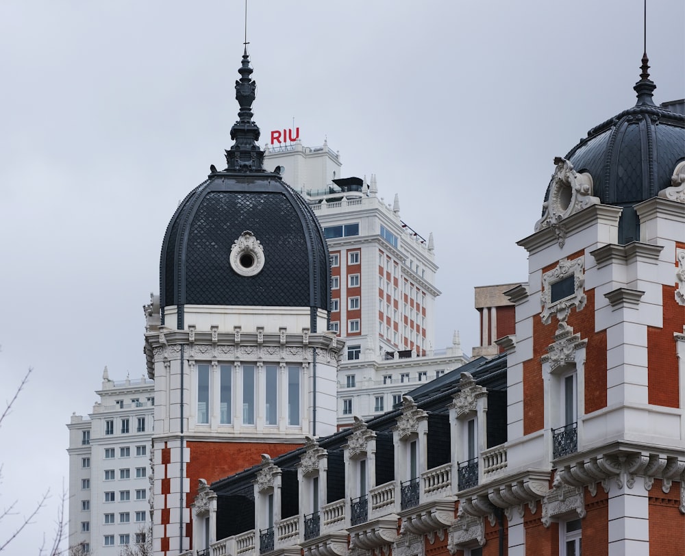 a clock on top of a building in a city