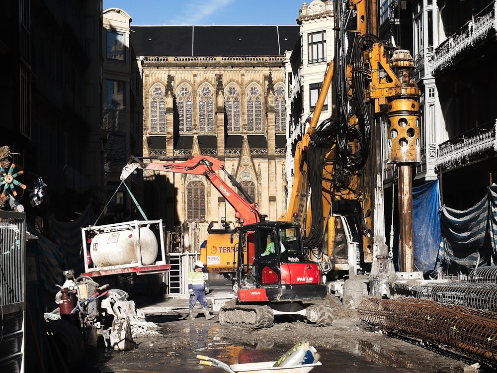 a construction site with a crane and construction equipment