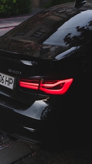 a close up of a bmw 3 series on premium tires sold at tyrepublic tire shop in nigeria