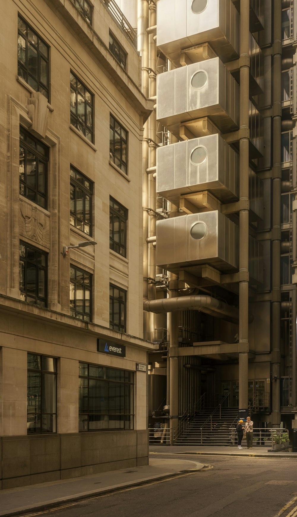 a tall building with multiple balconies on the side of it