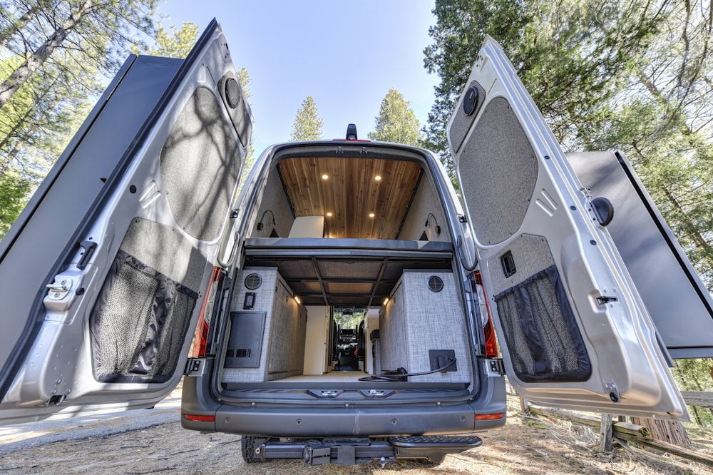 the back of a van with its doors open