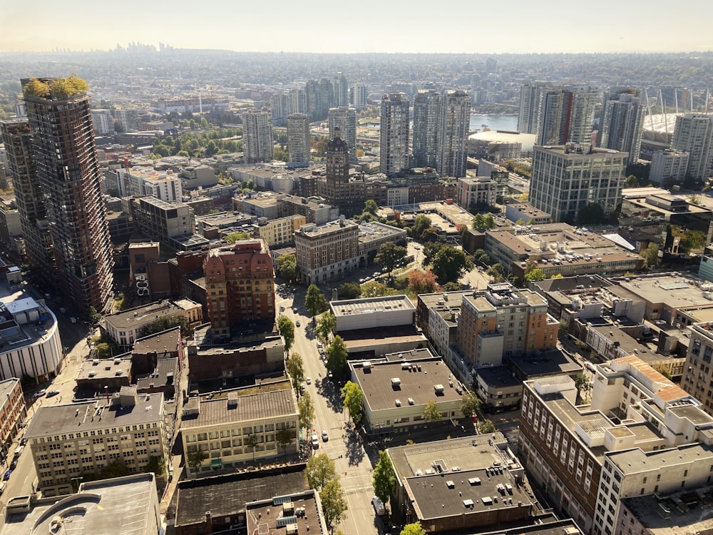 an aerial view of a city with tall buildings