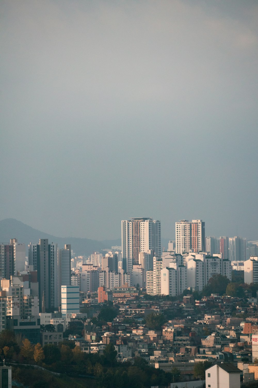 a view of a city with tall buildings