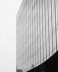 a black and white photo of a tall building
