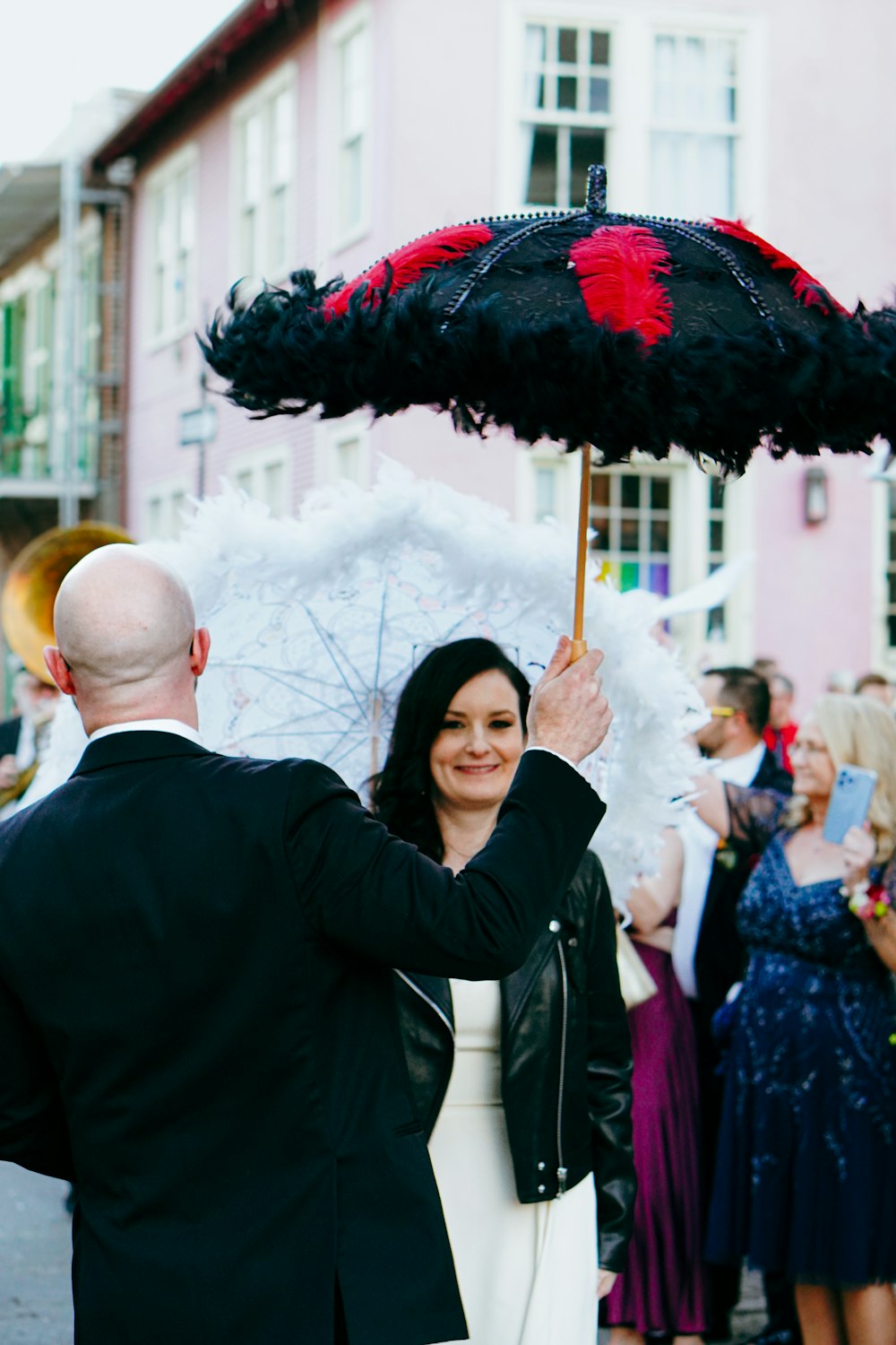a man and a woman holding an umbrella