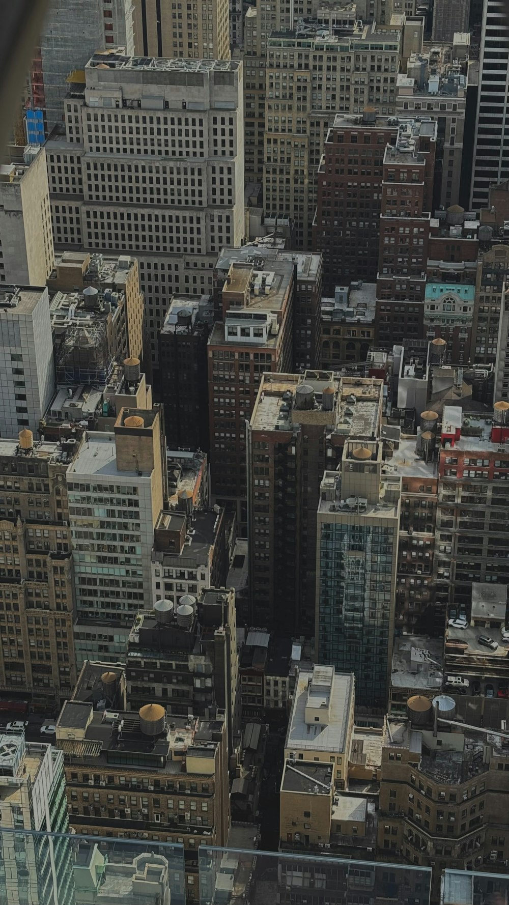 a view of a city from the top of a building