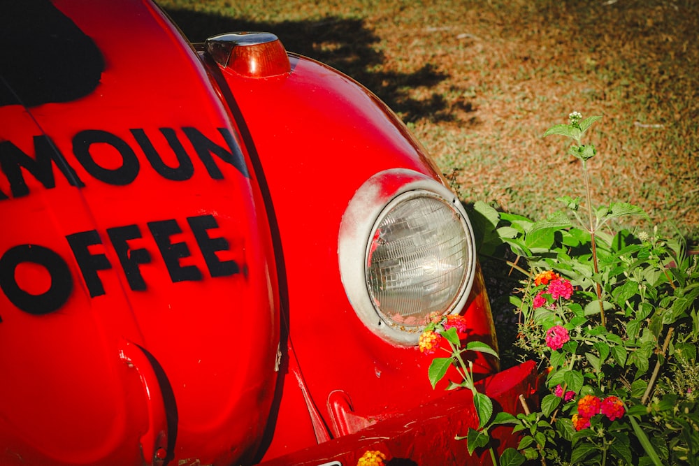 a close up of the front of a red truck