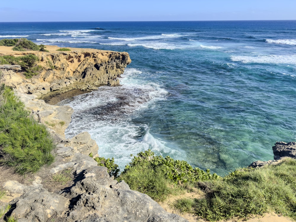 a view of the ocean from a cliff