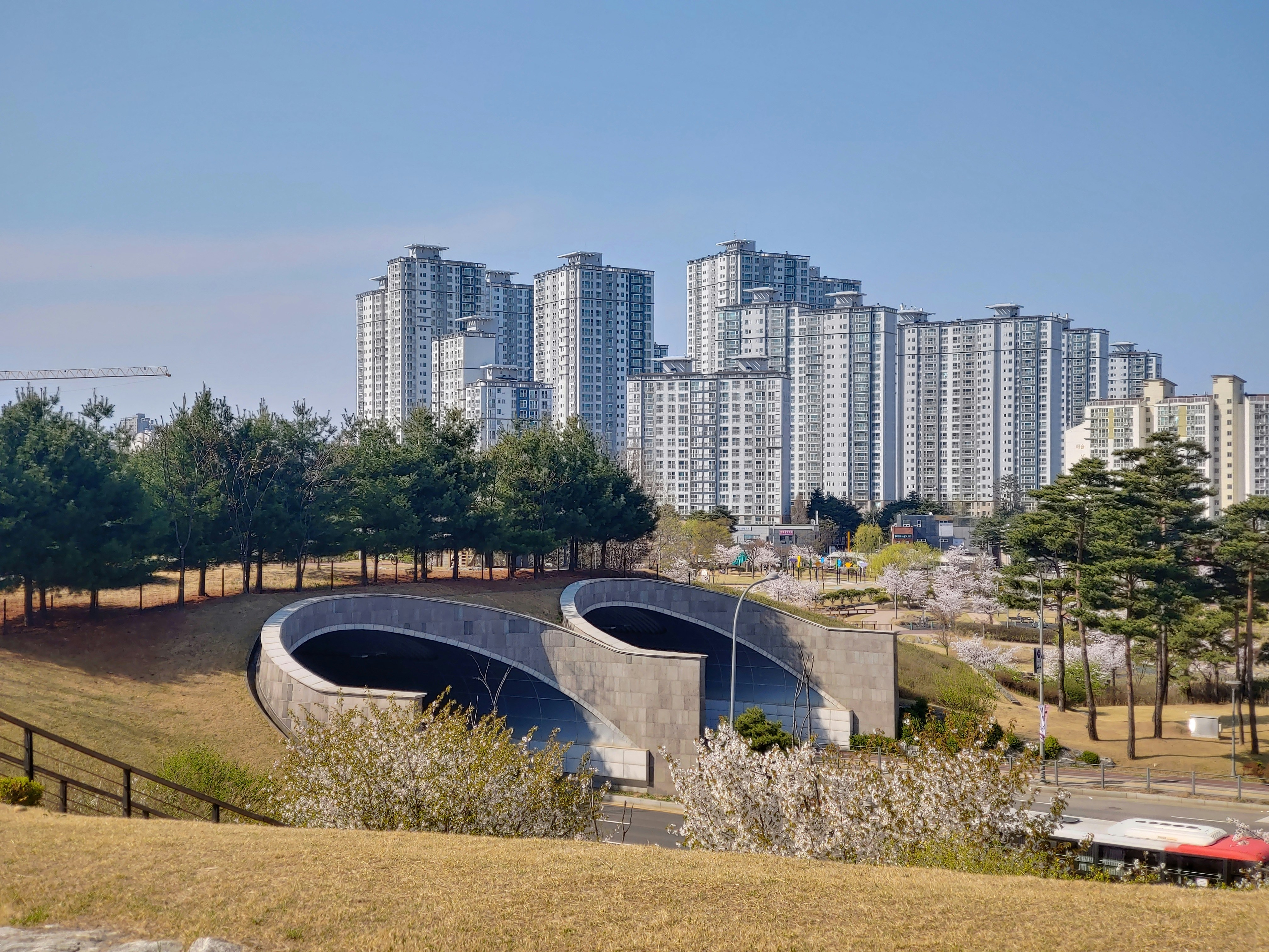a city skyline with tall buildings in the background