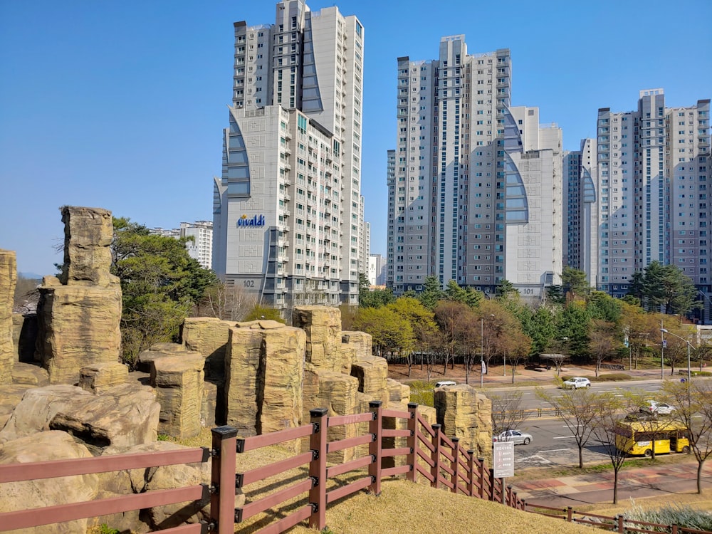 a view of a city with tall buildings in the background