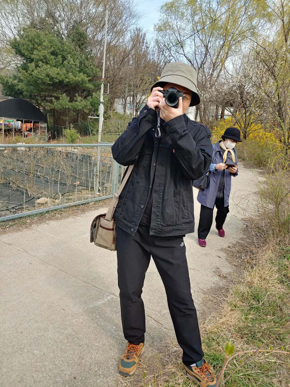 a man taking a picture with a camera