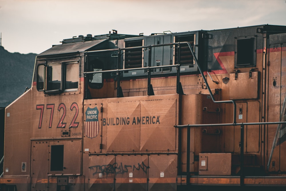 a train with graffiti on the side of it