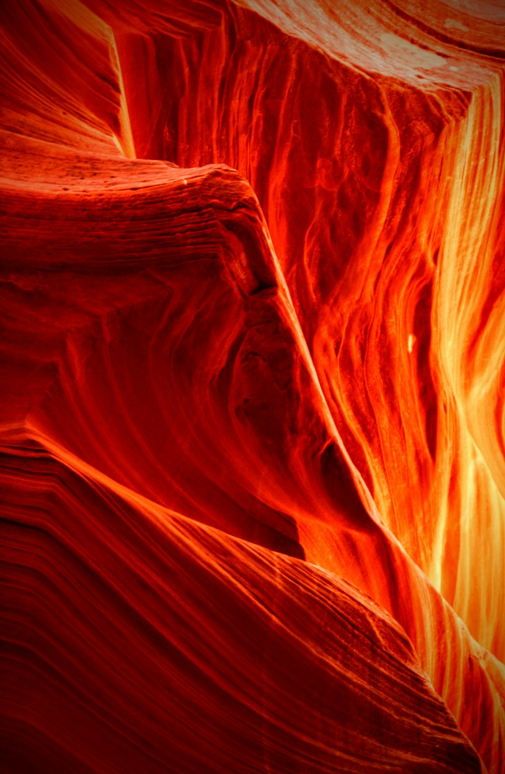 a close up of a red and yellow rock formation