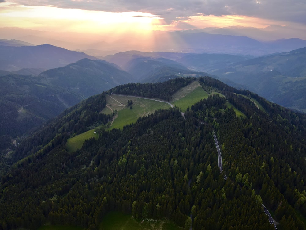 a scenic view of a valley and mountains