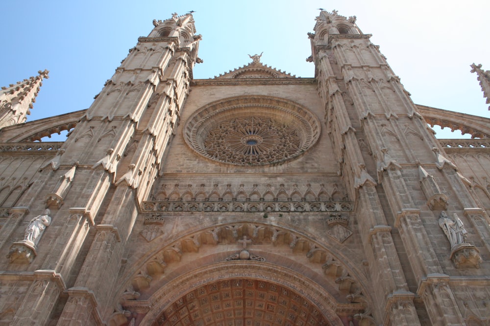 a large cathedral with a clock on the front of it