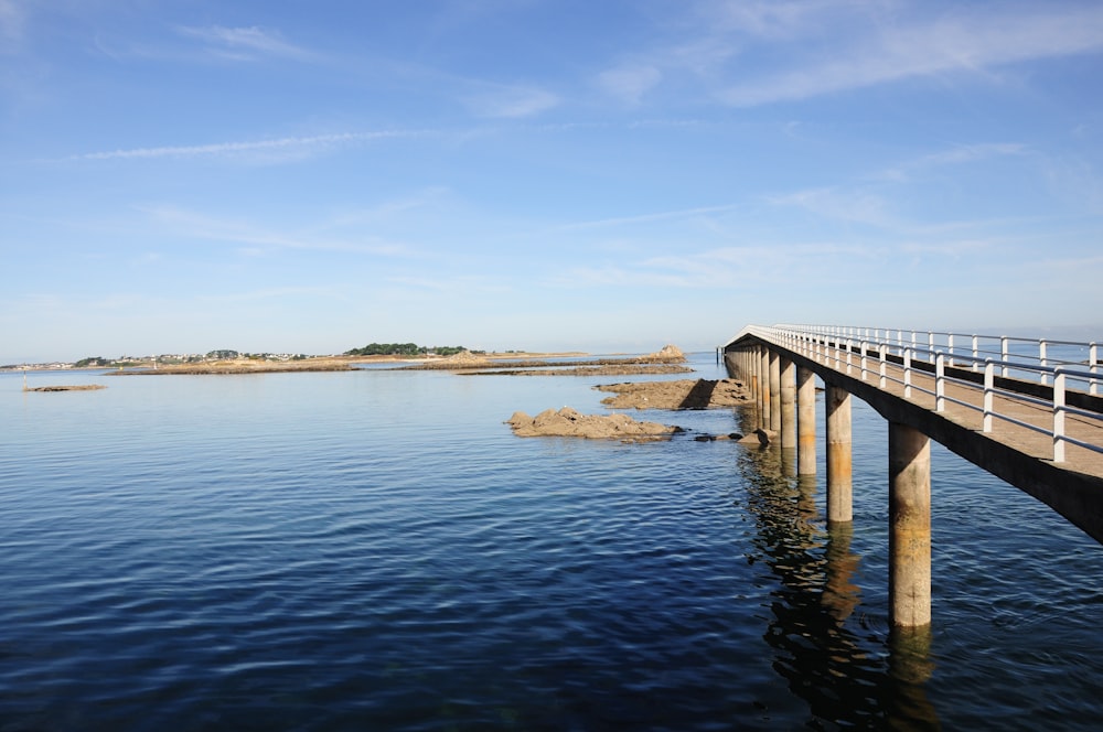 a wooden bridge over a body of water