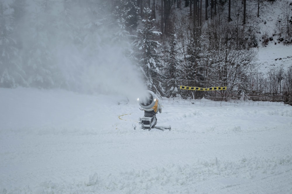 a man riding skis down a snow covered slope