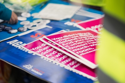 a table topped with lots of different types of stickers