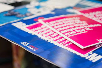 a close up of a bunch of stickers on a table