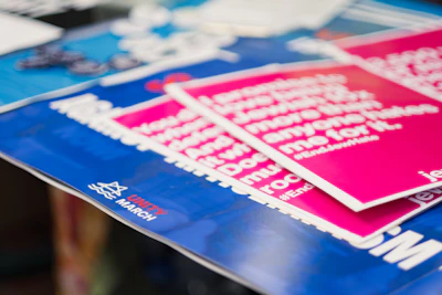 a close up of a bunch of stickers on a table