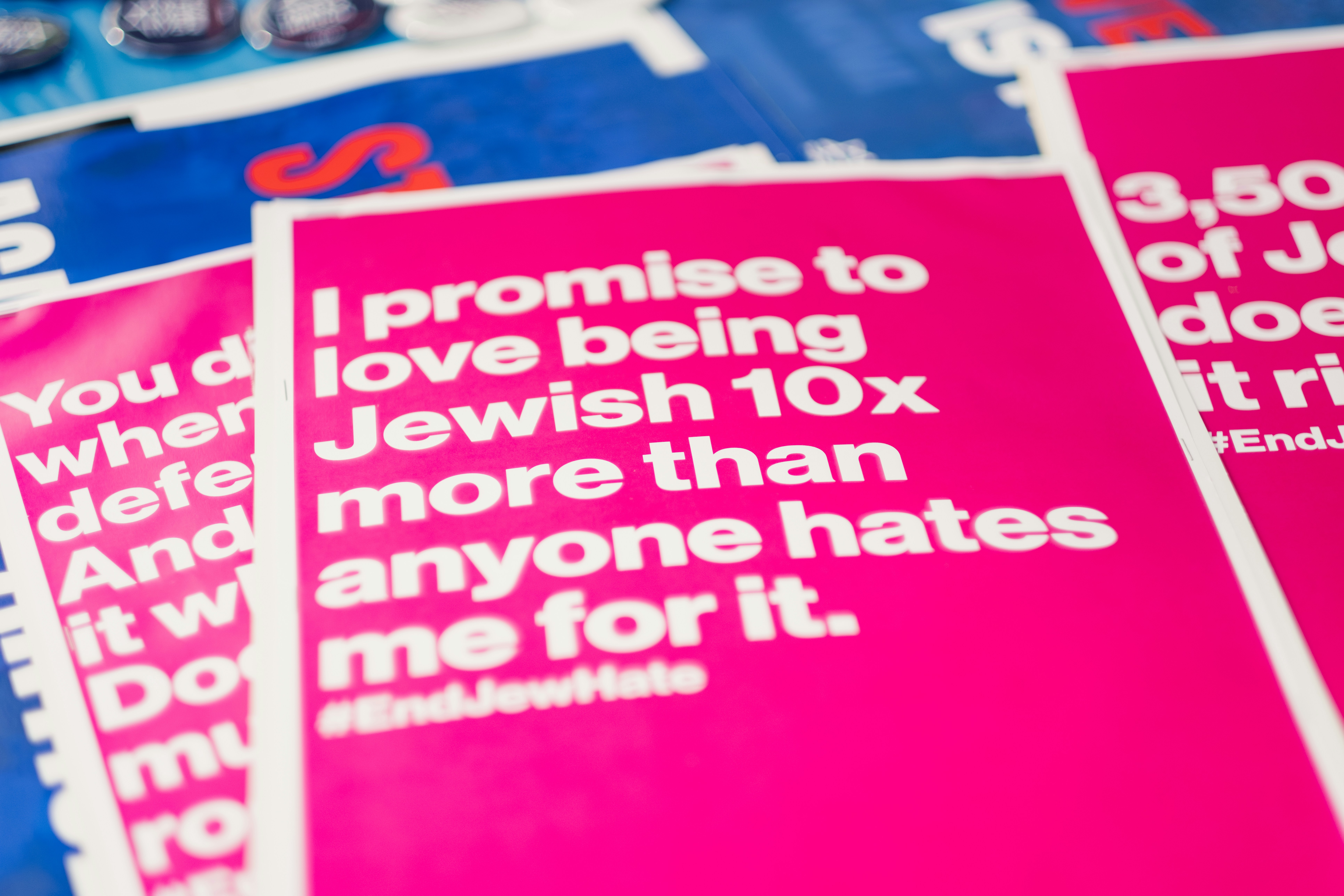 JewBelong posters at a march against antisemitism.