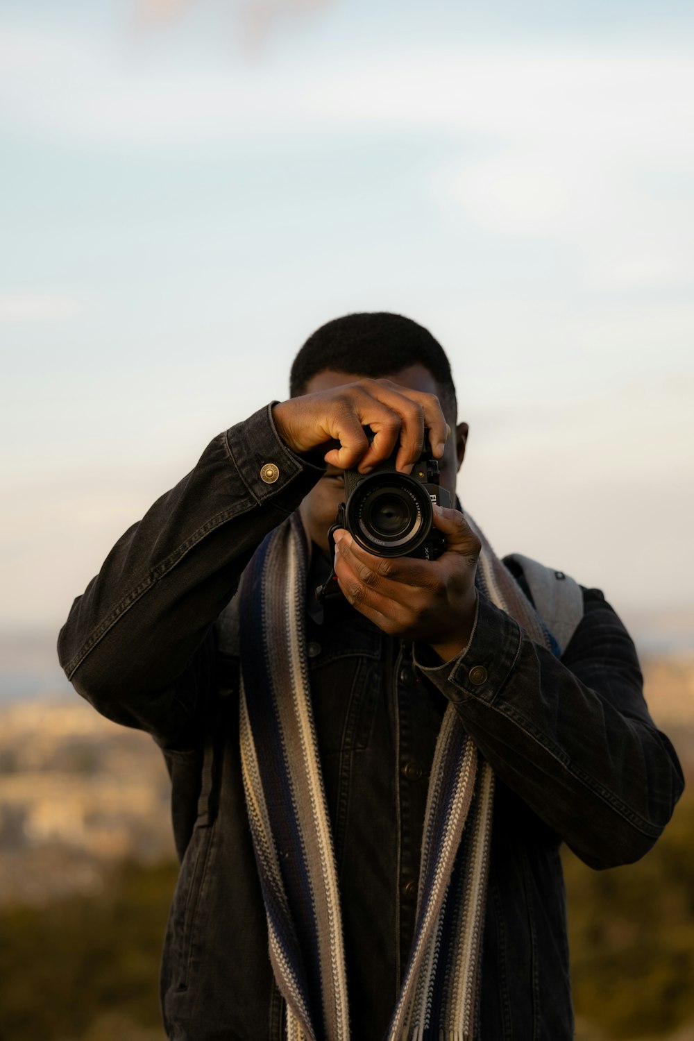 a man taking a picture with a camera