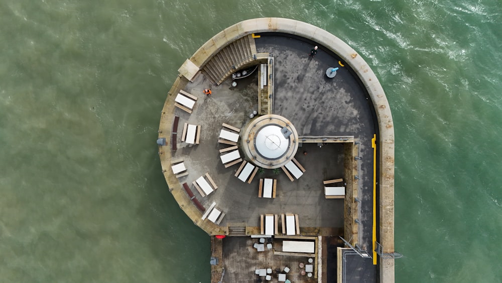 an aerial view of a restaurant on the water