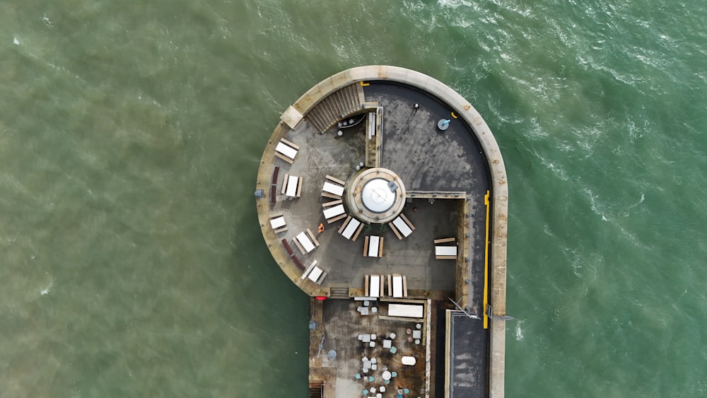 an aerial view of a boat dock in the water