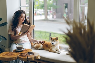 Health Vibes - relax with a good book beside your furry friend has lots of health benefits