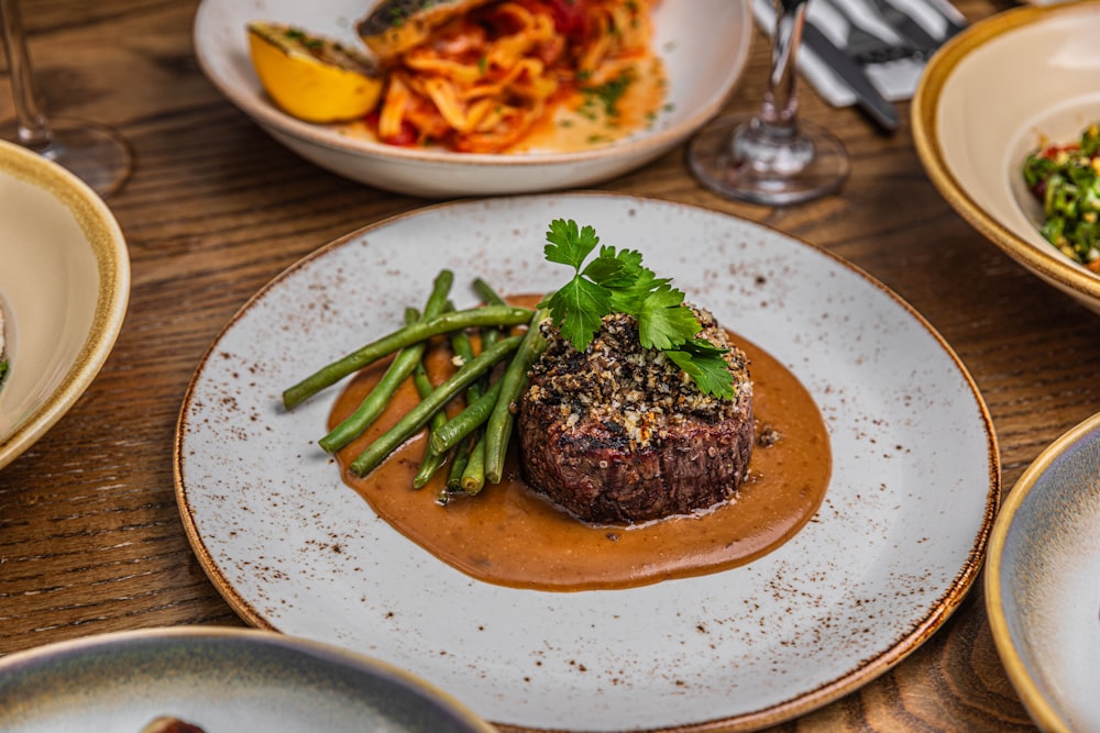 a plate of food on a wooden table