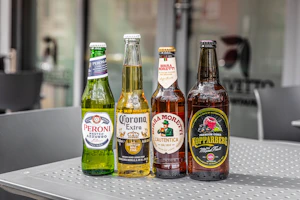 a group of bottles of beer sitting on top of a table