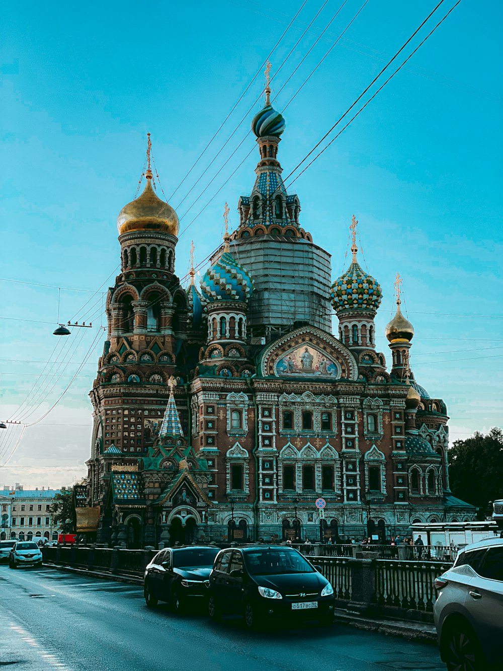 a large building with a golden dome on top of it