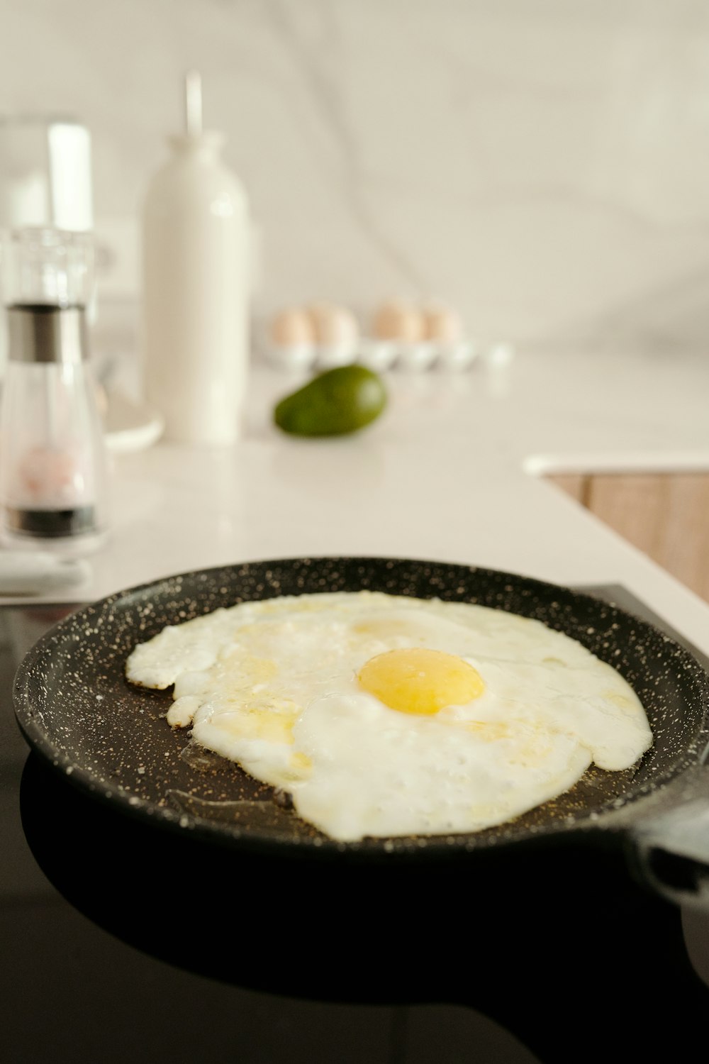 a frying pan with a fried egg in it