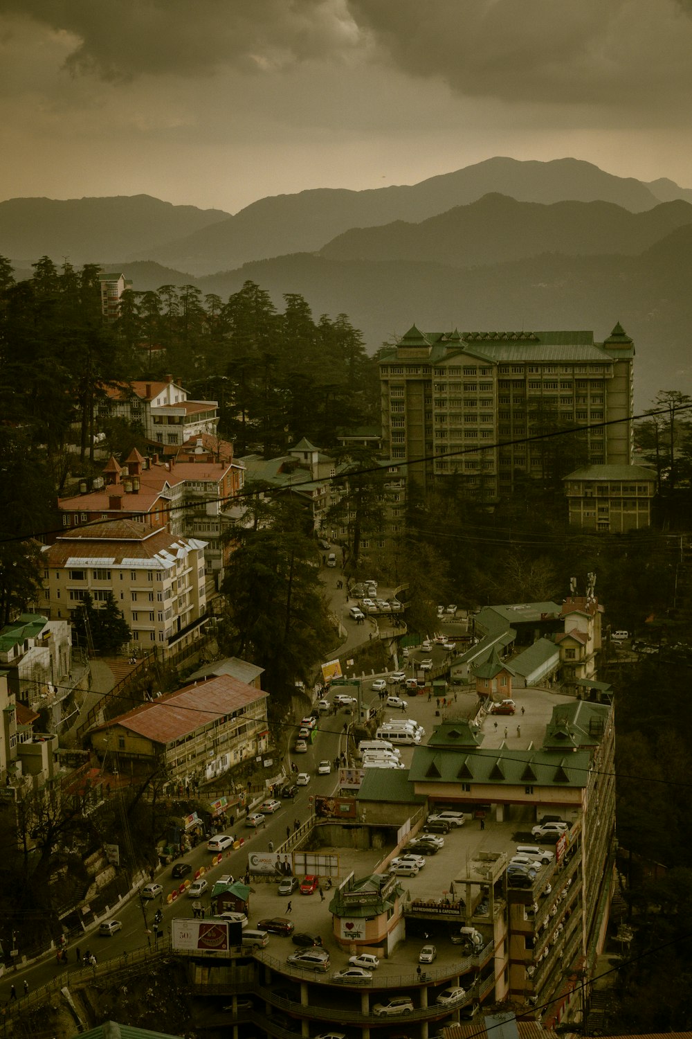 a view of a city with mountains in the background