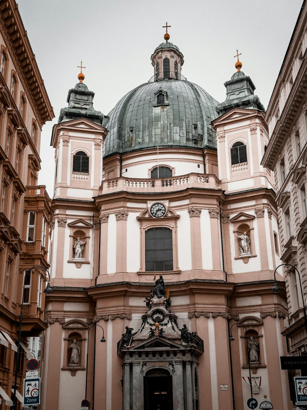 a large building with a clock on the top of it