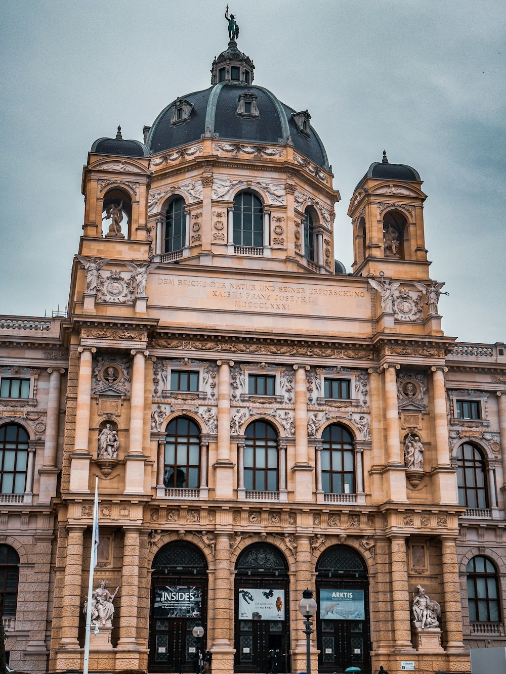 a large building with a clock on the top of it