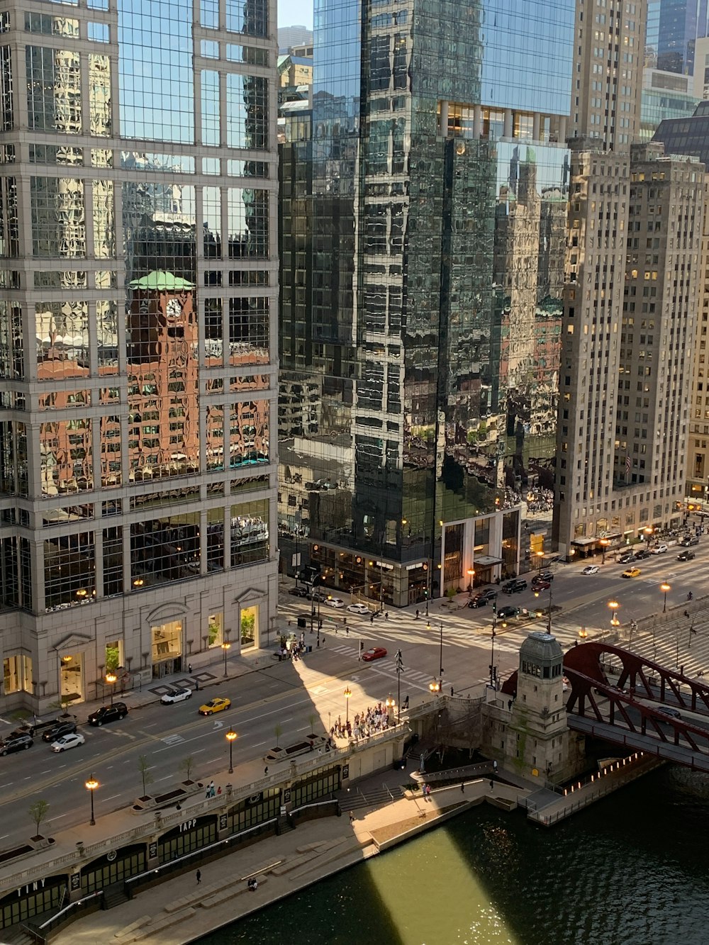 a view of a city from a bridge over a river