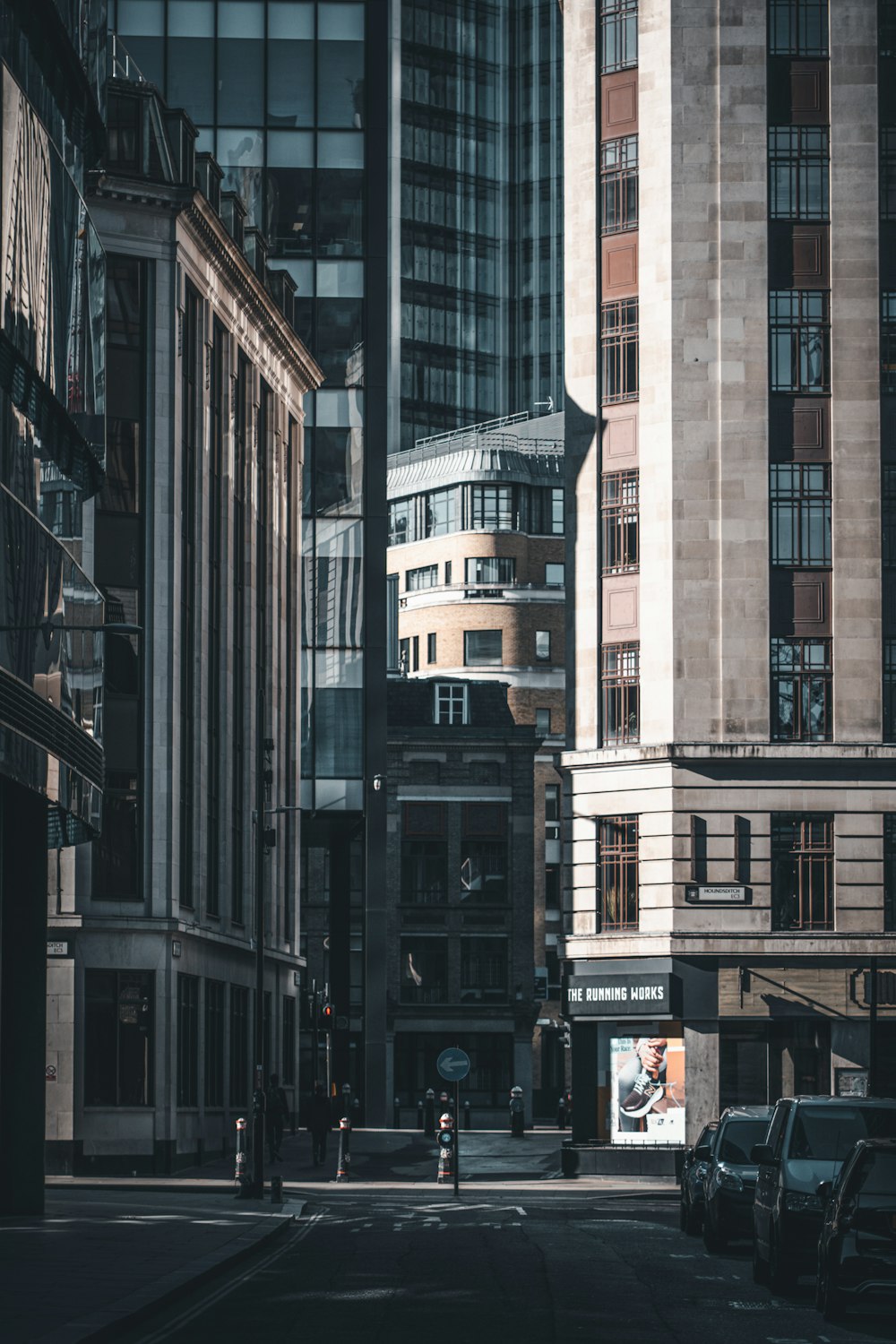 a city street filled with lots of tall buildings