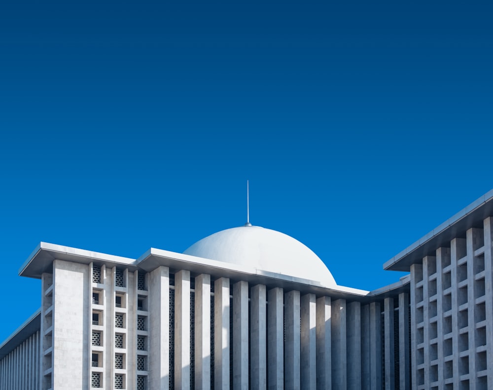 a large building with a white dome on top of it