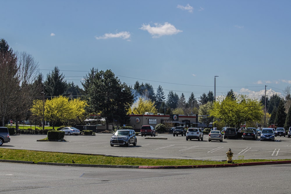 a parking lot filled with lots of parked cars