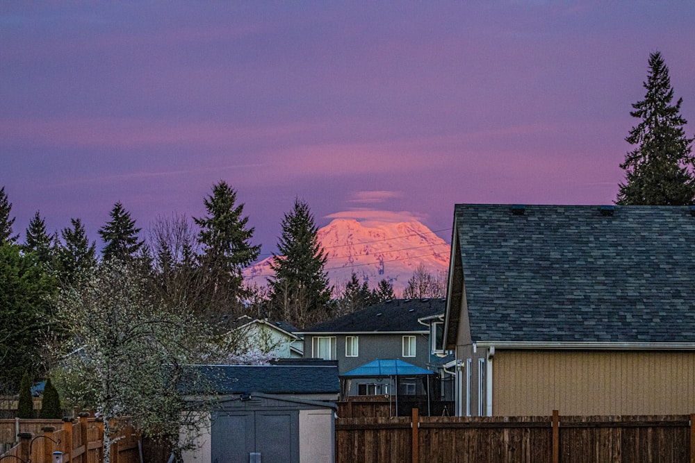 a view of a snow covered mountain in the distance