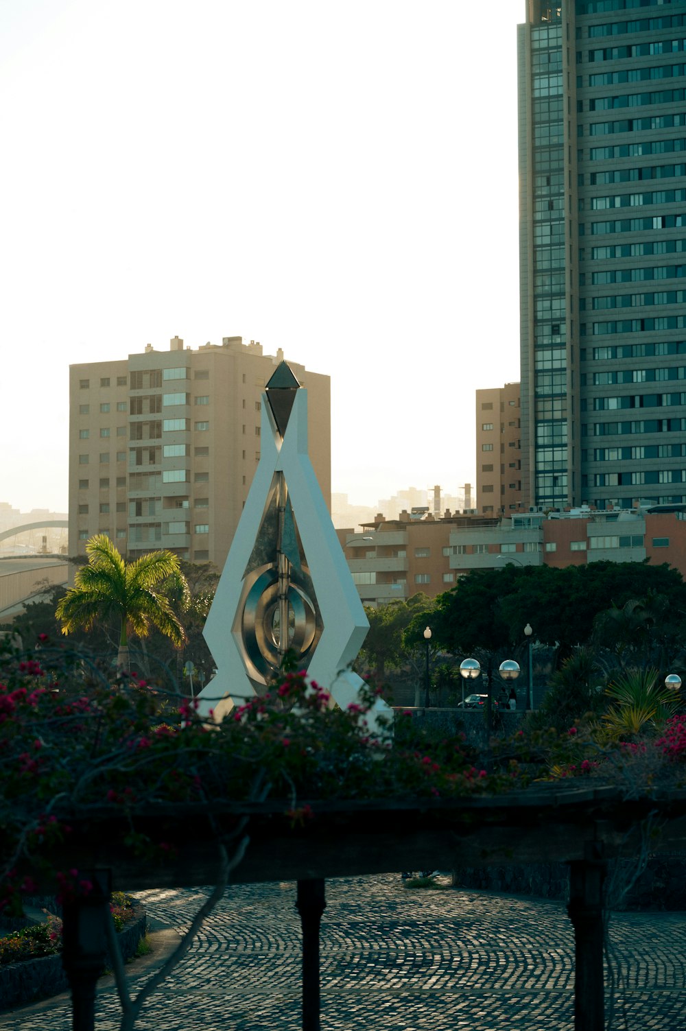 a clock tower in the middle of a city