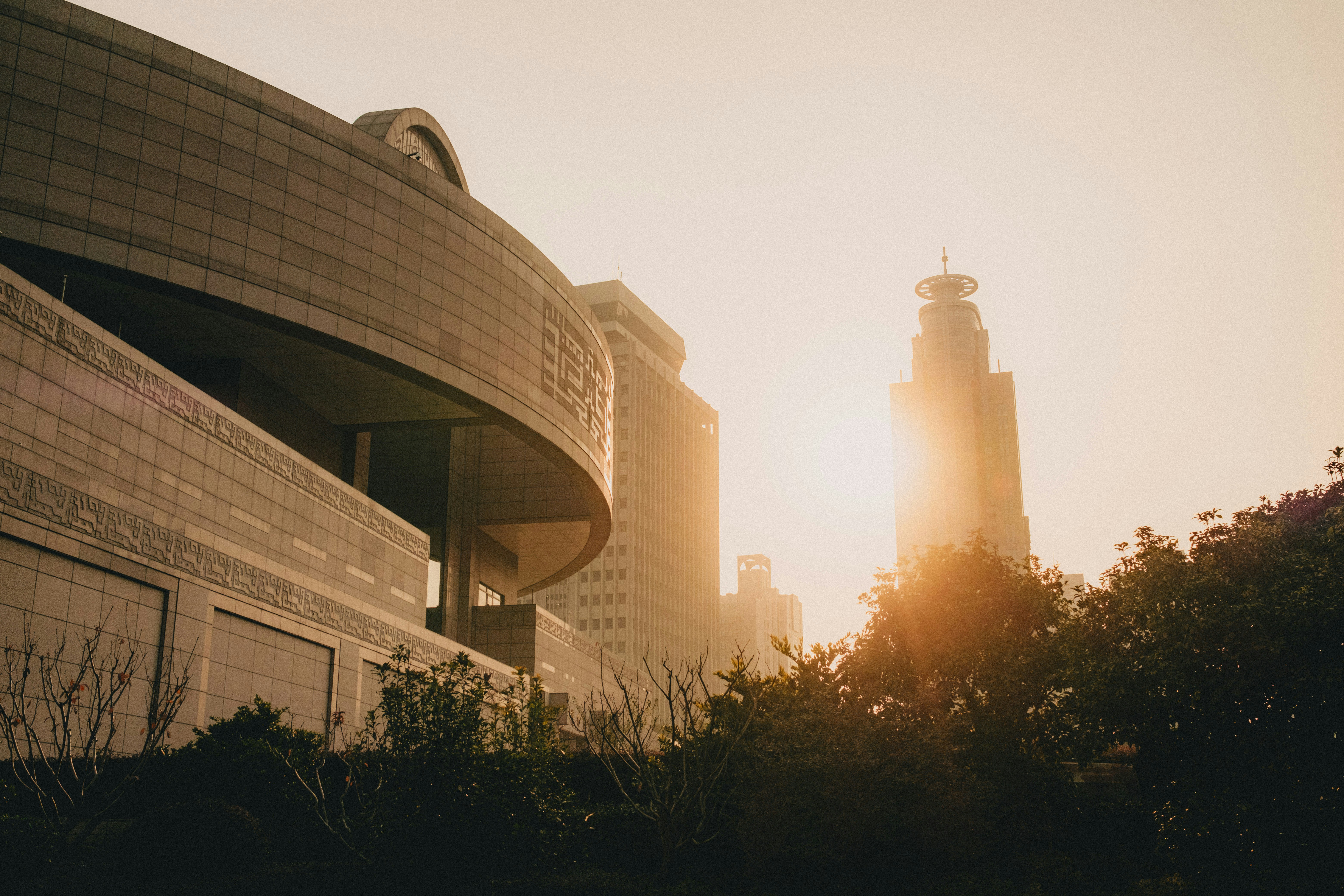 a building with a clock tower in the background