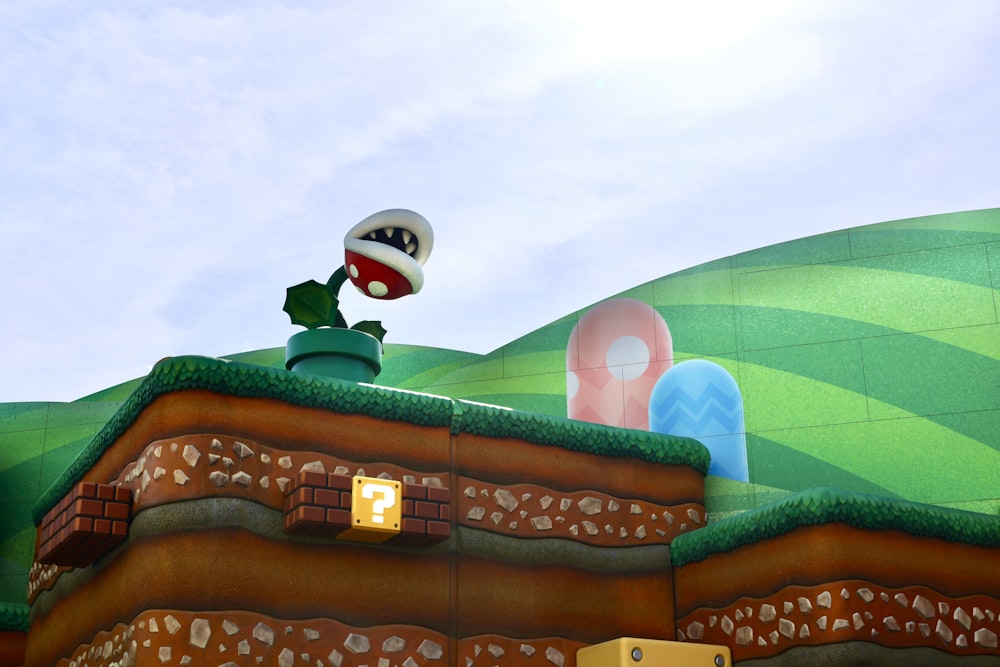 a nintendo wii game with a giant mushroom on top of it
