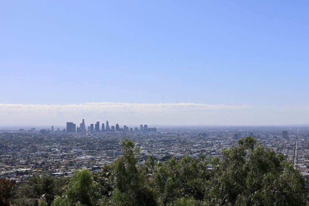 a view of a city from the top of a hill