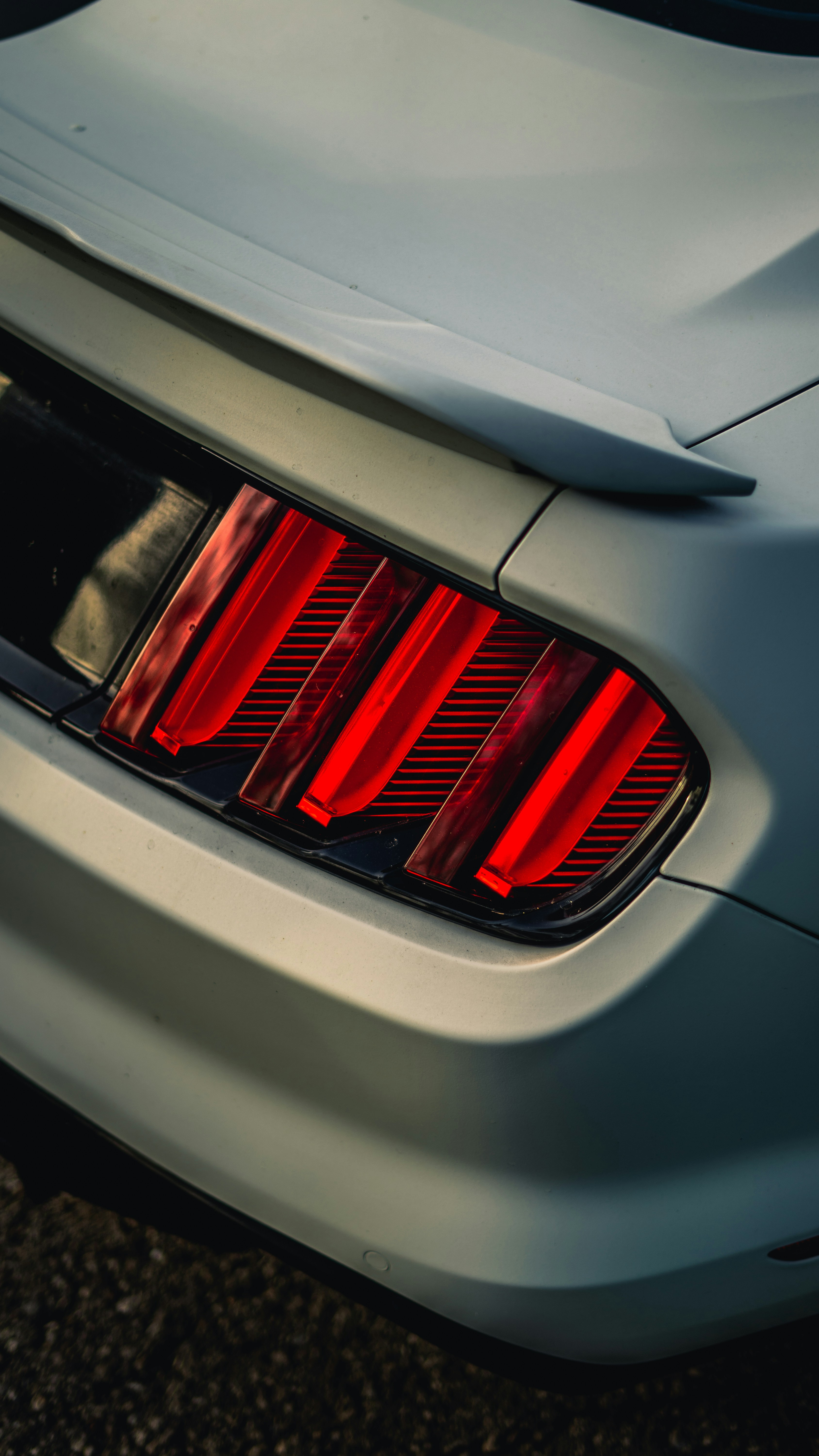 a close up of the tail lights of a car