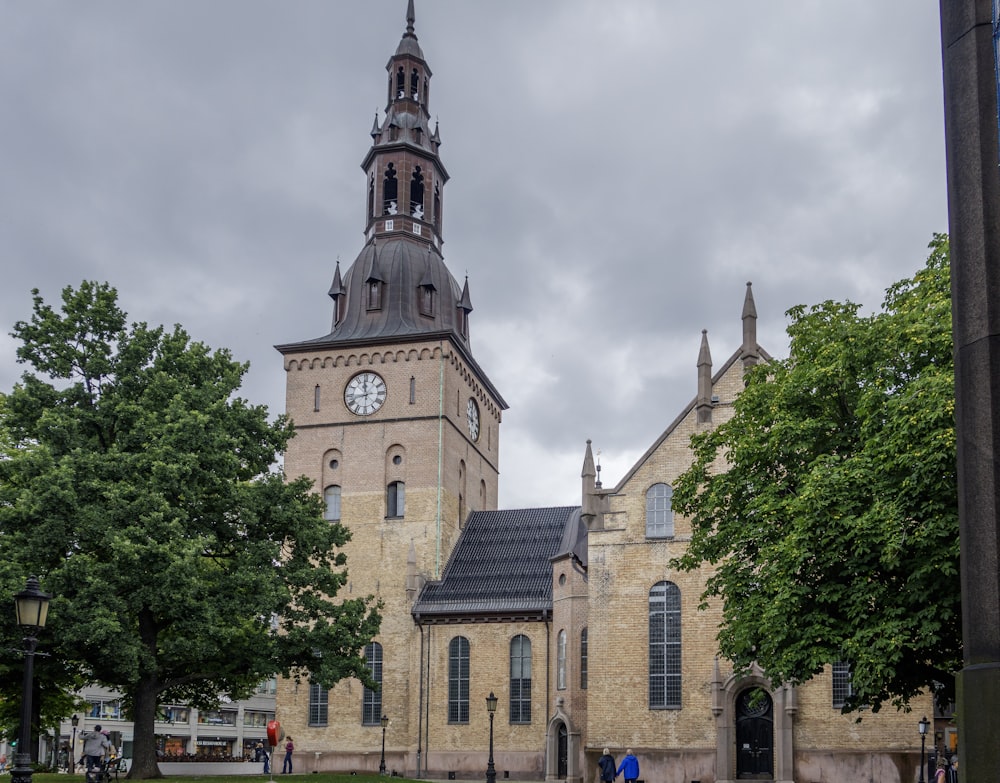 a large building with a clock on the top of it