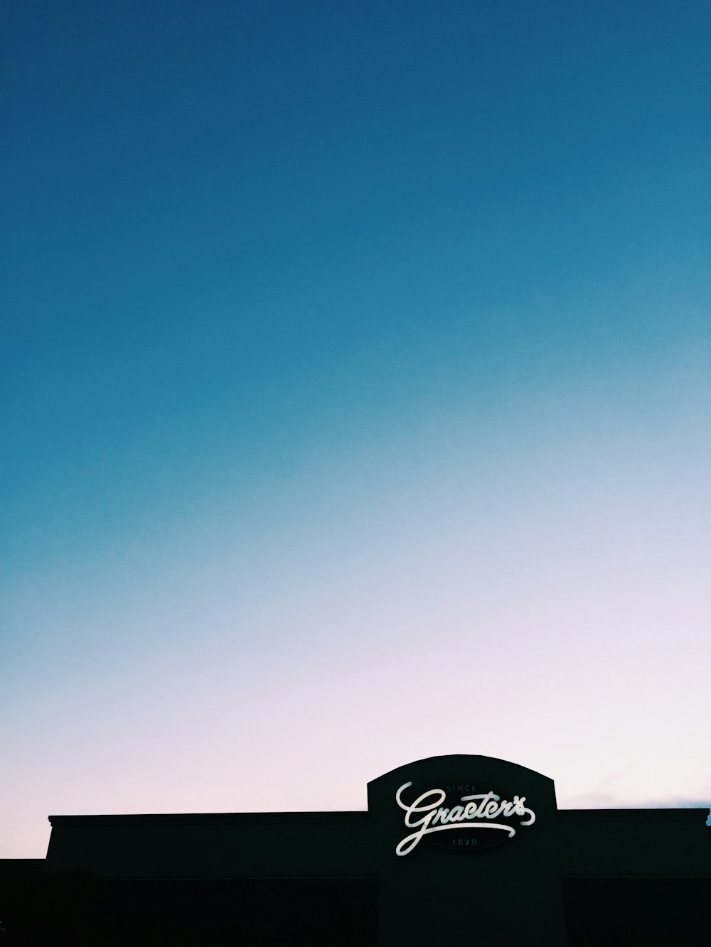 a tall building with a clock on the top of it